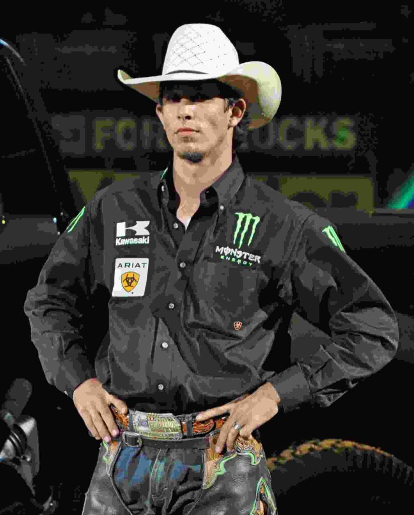 J.B. Mauney riding a bull during PBR competition